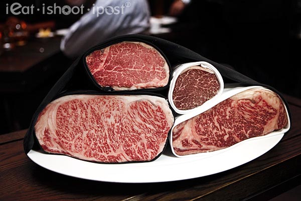 Selection of meats: Starting from top and moving clockwise: Japanese Wagyu Tenderloin, USDA prime tenderloin, US Kobe, Japanese Wagyu Sirloin