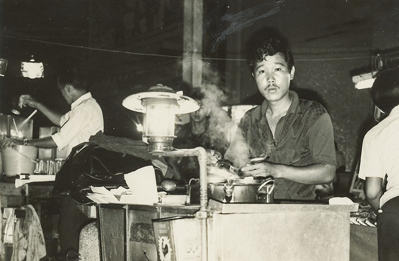 2nd Generation Mr Tan Cheong Chuan selling Kueh Tutu from a tricycle