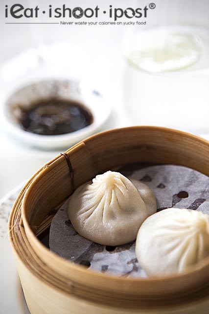 JQ’s Signature - Foie gras xiao long bao,consumme of black truffle, braised and minced pork