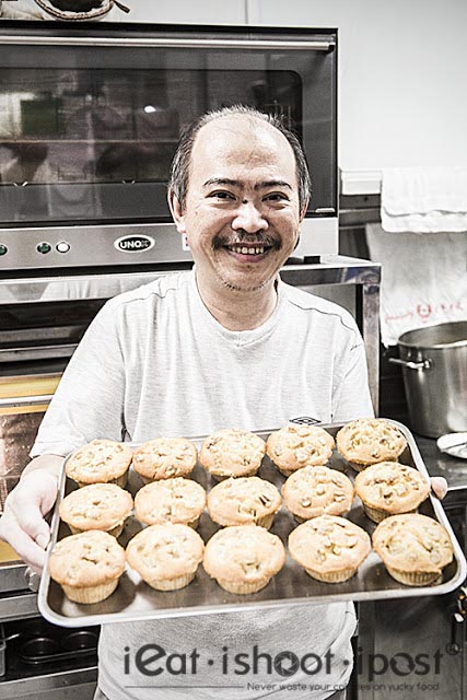 Chef Johnny Ngiam with a tray of freshly baked muffins