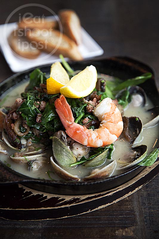 Clam casserole with garlic pork sausage, with sourdough $36