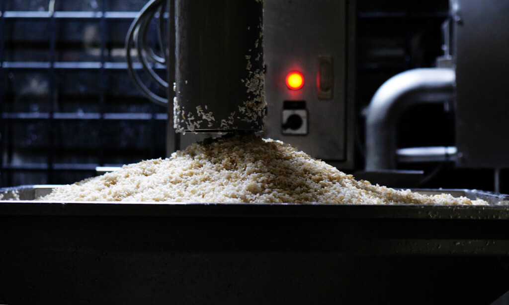 Brown rice being milled