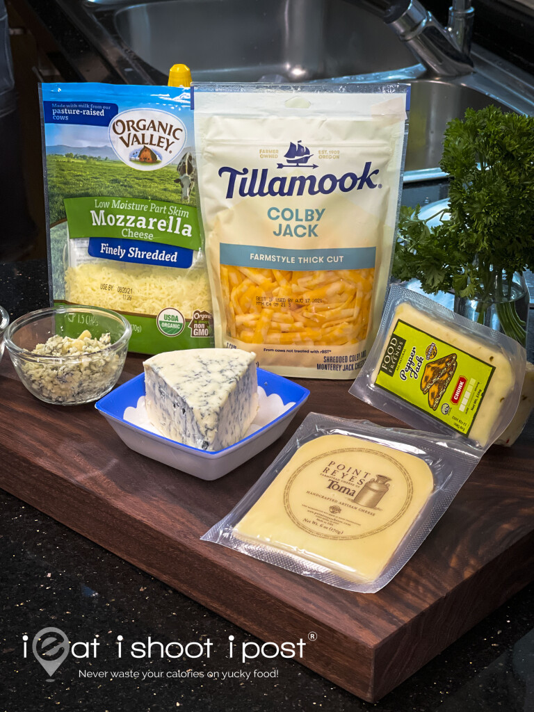 Clockwise from top left - Organic Valley Shredded Mozzarella, Tillamook Colby Jack, Food for Friends Pepper Jack, Point Reyes Toma and Point Reyes Blue